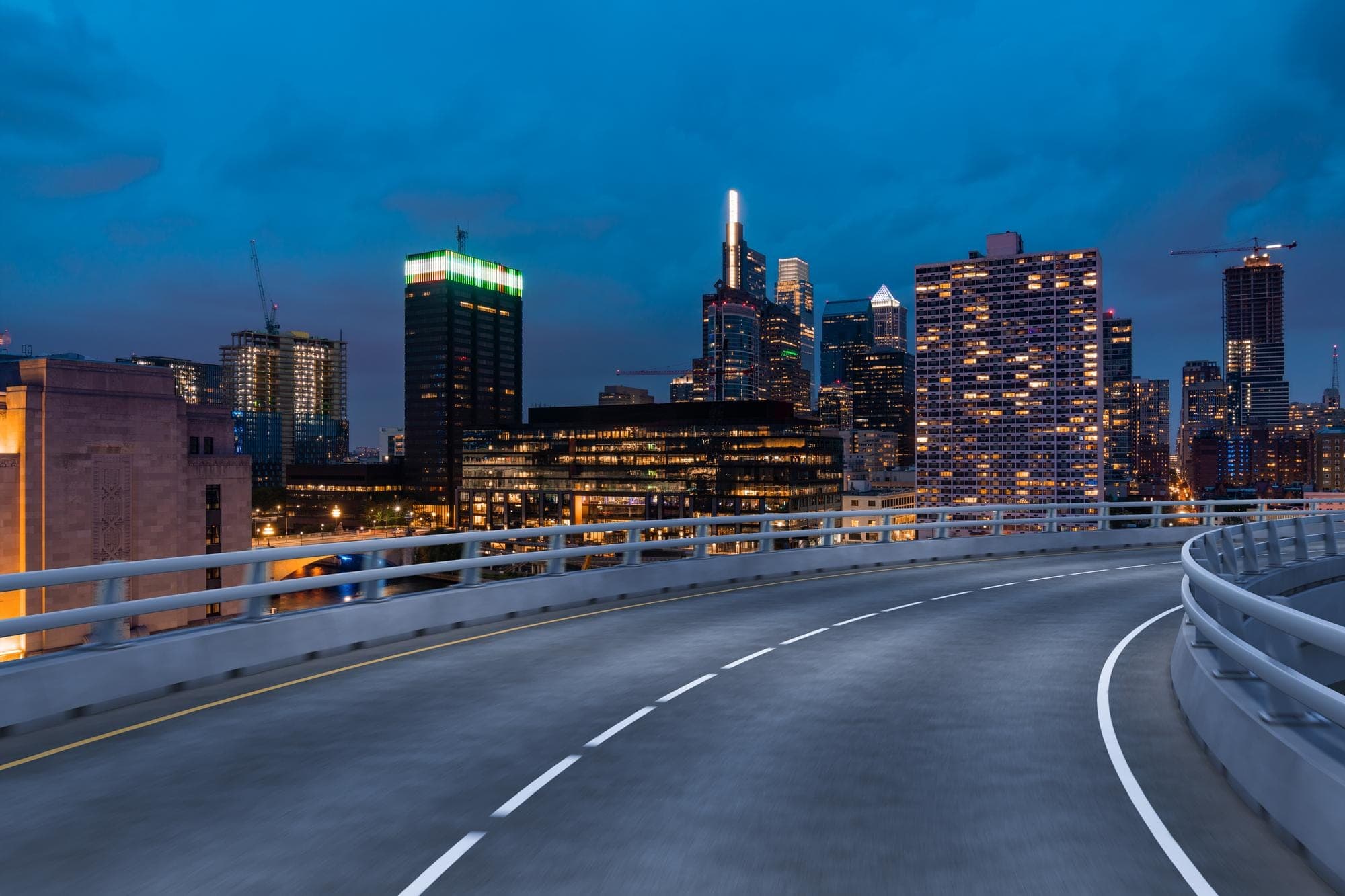 A downtown Philadelphia road with the city skyline behind it